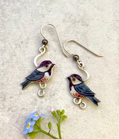 "These Chickadee Earrings will be constant reminders of the lightness of the chickadee. They would be the perfect gift for a friend or yourself. Their size is 1\" x .75, not including the earring wires, but including the silver vine that they perch on." Elegant Bird Design Drop Earrings, Whimsical Silver Metal Earrings, Whimsical Sterling Silver Hypoallergenic Jewelry, Adjustable Bird Design Jewelry For Gifts, Adjustable Bird Design Jewelry As Gift, Adjustable Bird Design Jewelry Gift, Whimsical Silver Hypoallergenic Earrings, Whimsical Sterling Silver Jewelry With Matching Earrings, Whimsical Silver Earrings For Gift