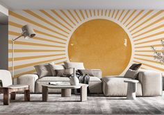 a living room with sunburst painted on the wall