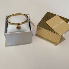 Michael Kors Gold Logo Pave Crystal Charm Bangle Bracelet-Nwt Beautiful And Sophisticated Bracelet With Pave Crystal Charm Accents. - Color: Gold With Crystal Accents - Clasp Closure Gold-tone Bracelet With Logo Charm As Gift, Gold-tone Bracelet With Logo Charm, Tortoise Shell Bracelet, Michael Kors Bracelet, Heart Bangle Bracelet, Pave Bangle, Pave Bracelet, Rose Gold Logo, Michael Kors Jewelry