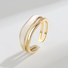 Style: Fashion OL Color: Yellow Gold Size: Adjustable Opening Fashion Element: Geometry Modern White Open Band Ring, Minimalist White Metal Rings, Minimalist White Metal Ring, Modern Adjustable White Rings, Modern White Adjustable Rings, Modern White Adjustable Ring, Modern White Open Ring, Trendy Gold Open Enamel Ring, Trendy Gold Enamel Open Ring