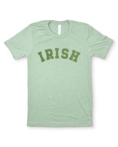 A simple & modern St Patricks Day graphic tee for women or men, perfect for celebrating the Irish holiday or giving as a St Patricks gift for a wife, sister or friend. Features a minimalistic green and yellow gold arched "IRISH" text design printed on our cozy heather sage green gender neutral crew neck tee. Made from quality, buttery-soft airlume cotton that provides all day comfort, breathability & durability. ☑ 52% airlume cotton + 48% polyester☑ Buttery-soft, light-weight & breathable materi Irish Tshirts, Lucky Shirt, Graphic Tops, Tees For Women, Text Design, Crew Neck Tee, Soft Light, Celebration Of Life, St Patricks