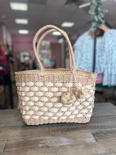 This stylish tote is the perfect accessory for your summer vacation! Its two-toned design and spacious interior give you loads of packing room without sacrificing on style. Pack your cares away in this chic and sassy bag! There is a permanent pouch on the side that allows you to keep everything in the bag secured and private. Width - 12Height - 9"Depth - 4.5" Packing Room, In The Bag, Medium Tote, Love And Respect, Summer Vacation, Two Tone, Straw, Pouch, Design