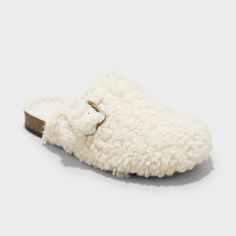 Comfy, cute and cozy, these Faux-Shearling Loafer Slippers from Cat & Jack™ add sweet style to your child's wardrobe. In a soft ivory hue, these slippers are made with plush faux shearling and a contoured footbed for all-day comfort. A closed-toe upper accented with a gold-tone buckle, plus slip-on style, complete the look. Cat & Jack™: Designed for all children so you can trust it's made for yours. Construction For Kids, Clog Slippers, Loafer Slippers, Clog Sandals, Sweet Style, Cat & Jack, Girls Shopping, Kid Shoes, Kids Shoes