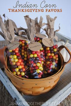 a basket filled with lots of candy sitting on top of a table