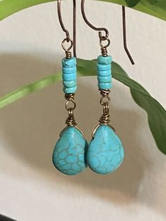 "12x15mm Blue turquoise magnesite stone teardrop, bronze tone 2\" long dangling earrings. Hand made Jewelry. All purchase will arrive in gift boxes Thanks for stopping by!" Adjustable Blue Bohemian Teardrop Earrings, Blue Wire Wrapped Bohemian Teardrop Earrings, Blue Bohemian Teardrop Earrings With Wire Wrapped, Bohemian Blue Wire Wrapped Teardrop Earrings, Turquoise Wire Wrapped Teardrop Dangle Earrings, Adjustable Turquoise Teardrop Earrings, Bohemian Turquoise Teardrop Drop Earrings, Turquoise Bohemian Teardrop Earrings, Turquoise Wire Wrapped Teardrop Earrings