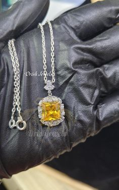 This stunning necklace features a vibrant yellow princess cut CZ diamond and delicate white round CZ floral pendant, crafted from 925 sterling silver. Perfect for gifting to your loved ones, with 1 day shipping available. 1 DAY SHIPPING ⭐ Handmade Product ⭐ Base Metal: Sterling Silver ⭐ Metal Purity: 925 parts per 1000 ⭐ Finish: 14K White Gold Plated ⭐ Main Stone Clarity: VVS1 ⭐ Main Stone Creation: Simulated ⭐ Stone Color: Yellow & White ⭐ Stone Shape: Princess ⭐ Gender: Female ⭐ Express Shippi Formal Yellow Necklace With Brilliant Cut, Classic Yellow Diamond Jewelry, Luxury Yellow Necklaces For Anniversary, Formal Yellow Diamond Necklace, Fine Jewelry Princess Cut Cubic Zirconia Necklace, Fine Jewelry Cubic Zirconia Princess Cut Necklace, Luxury Yellow Cubic Zirconia Necklaces, White Gold Square Pendant Jewelry, White Gold Citrine Jewelry With Halo Setting