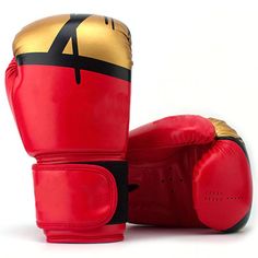 a pair of red boxing gloves sitting on top of each other