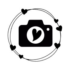 a camera with hearts around it