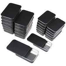 a set of six square tins sitting on top of each other