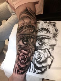 a person with a tattoo on their arm and an eye in the middle of it