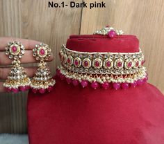 *Light Weight kundan choker necklace set. *Beautiful & Light in weight. *Necklace width: 1.6 inches (included drops) *Earrings length: 2.6 inches (with drops) *Dome size: 1.1 inches Pink Necklace Jewelry Indian, Pink Choker For Diwali Gift, Pink Temple Jewelry Choker For Festive Occasions, Pink Choker For Party And Festivals, Pink Temple Jewelry Choker For Festive Season, Traditional Pink Choker For Festive Occasions, Pink Temple Jewelry Choker As Gift, Pink Choker For Festivals Gift, Pink Festive Choker For Festivals