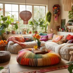 a living room filled with lots of furniture and plants