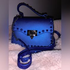 Gorgeous Royal Blue Convertible Crossbody Mini Handbag With Rubber Studs! Detachable Strap For Carrying Small Bag- Can Fit Cardholder, Cell Phone, And Makeup Items 7.5x5.5 Top Of Strap To Bottom Of Bag: 2ft 8 Inches Never Used Excellent Like New Condition Blue Shoulder Bag With Adjustable Strap For Party, Casual Blue Shoulder Bag For Evening, Blue Shoulder Bag With Adjustable Strap For Evening, Evening Blue Shoulder Bag With Adjustable Strap, Chic Blue Shoulder Bag For Party, Blue Shoulder Bag With Detachable Strap For Summer, Blue Evening Shoulder Bag With Adjustable Strap, Blue Evening Bags For Summer, Elegant Blue Shoulder Bag For Summer