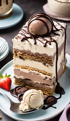 a piece of cake on a plate with ice cream and strawberries