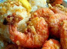 some shrimp and rice are on a plate