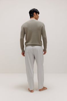 A timeless, versatile cool-weather style staple, our Men’s Knitted Sweater is made from 100% wool to be a cozy essential and pair well with anything – in one day you can wear it over any shirt for a nice work-from-home outfit, then layer on a jacket as you head out for a casual evening event. Details Materials & Care Shipping & Returns • Long sleeve with classic crew neck, a cozy staple for your fall and winter wardrobe.• Made from genuine sheep's wool: soft, warm, yet breathable. Size M is 26.8 Merino Wool V-neck Sweater With Ribbed Cuffs For Work, Classic Knit Sweater For Loungewear, Merino Wool Knit Sweater For Work, Relaxed Fit Knit Polo Sweater For Work, Classic Merino Wool Outerwear With Relaxed Fit, Classic Long Sleeve Polo Sweater For Loungewear, Casual Cashmere Polo Sweater For Layering, Casual Cashmere Knit Cardigan, Merino Wool Sweater For Layering