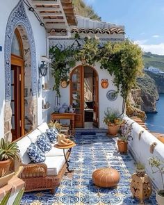 an outdoor patio with blue and white tiles