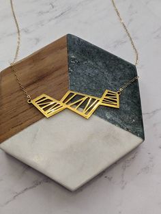 Gold Necklace Nickel Free For Gifts, Unique Faceted Jewelry For Gifts, Faceted Gold Jewelry As Gift, Gold Faceted Jewelry Gift, Faceted Gold Jewelry For Gift, Adjustable Rectangular Necklace As A Gift, Adjustable Rectangular Necklace For Gifts, Adjustable Rectangular Necklace For Gift, Modern Gold Jewelry For Gifts