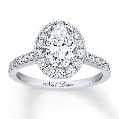 a diamond engagement ring with the words not lone written on it and surrounded by diamonds