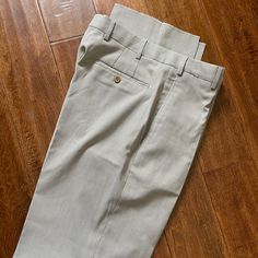 Zanella Dress Pants. Size 33 Never Worn. Light Beige Pin Stripes. Semi-formal Beige Trousers, Khaki Fitted Full-length Bottoms, Fitted Beige Chinos, Fitted Full-length Khaki Bottoms, Fitted Full Length Khaki Bottoms, Fitted Full-length Beige Chinos, Fitted Full Length Beige Chinos, Elegant Full-length Chinos For Spring, Elegant Full Length Chinos For Spring