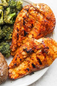 grilled chicken, broccoli and potatoes on a plate