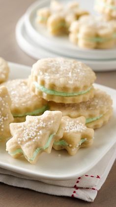 some cookies are sitting on a white plate