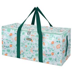 an image of a duffel bag with flowers and plants on it