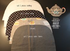 the baby's bib and diaper are laid out on top of each other