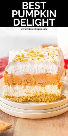 the best pumpkin delight layered dessert on a white plate with text overlay that reads, best pumpkin delight