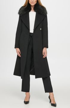 An inset bib panel with a stand collar brings runway-ready edginess to a belted coat woven from a luxurious wool blend. 46" length (size S) Drape collar with inset stand collar Long sleeves Asymmetric zip closure Front welt pockets Lined Shell: 60% wool, 40% polyester; Faux fur: 50% acrylic, 50% modacrylic   Dry clean Imported Model Stats: 5'10" height; 34" bust; 27" waist; 35" hips. Model is wearing size S. Fashion Basics, Belted Coat, Karl Lagerfeld Paris, Wool Blend Coat, Basic Style, Fur Trim, Welt Pockets, Karl Lagerfeld, Stand Collar