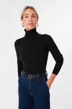 The Arlo Turtleneck Sweater is a classic layering piece that you’ll be wearing all season long, year after year. In a super comfy, stretch ribbed fabric, this fitted silhouette can be worn under a cardigan or tucked into your favorite denim. Style this versatile number under a blazer for a chic office outfit to give yo Stretch Turtleneck Sweater For Everyday, Everyday Stretch Turtleneck Sweater, Classic Ribbed Long Sleeve Turtleneck, Classic Knit Turtleneck For Fall, Ribbed Turtleneck Outerwear, Chic Turtleneck With Ribbed Cuffs For Layering, Fall Turtleneck With Ribbed Neckline, Ribbed Turtleneck Outerwear For Work, Classic Stretch Outerwear For Layering