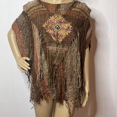 Handmade Macrame Knit Poncho Shawl  Beaded  Bohemian Knotted Fringe  Brown with Gold Metallic detailing. Slips on overhead with kimono sleeve. Free Size  27" in length from shoulder to longest point on hem Knotted Fringe, Poncho Shawl, Knit Poncho, Handmade Macrame, Knitted Poncho, Kimono Sleeve, Boho Bohemian, Brown Gold, Free Size