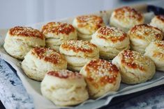 some biscuits are sitting on a plate and ready to be eaten