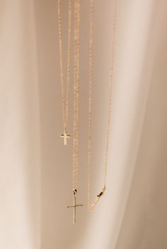 Our mini cross pendant is a dainty statement to add sparkle to any look. split 18k gold-filled mini cross pendant Your choice of chain length (16", 18", or 20") All materials are lead & nickel free Handmade with love by Luna & Jade in the U.S. Horizontal Cross Necklace, Edgy Rings, Everyday Wear Jewelry, Jewelry Christmas Tree, Handmade Gold Jewellery, Winter Jewelry, Mini Cross, Holiday Jewelry, Christmas Gift Jewelry