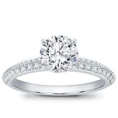 a white gold engagement ring with diamonds