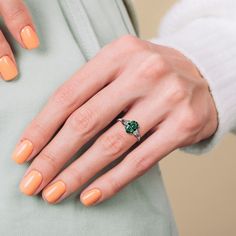 The May Emerald Birthstone Ring is a splendid celebration of those born in the lush springtime of May, created with S925 Sterling Silver for lasting grace. The ring showcases an emerald-colored centerpiece, treasured for its rich green hue that signifies rebirth and love. Designed to epitomize versatility and timeless elegance, this ring is the perfect homage to motherhood, serving as an ideal gift for Mother’s Day or a significant token for a mother with a May birthday. High-Quality Craftsmanship: Our dedication to excellence shines through in the meticulous crafting of this ring. Utilizing high-grade S925 Sterling Silver, we ensure that each piece retains its luster over time, standing up to daily wear while resisting tarnishing. The precision in the cut and polish of the sterling silver