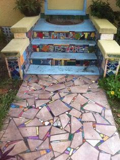 the steps are painted with colorful mosaic tiles