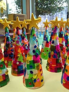 many colorful party hats with stars on them