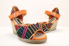 "Comfortable Handmade Women's Wedge Sandals Mola Shoes US Size 6 with 100% handmade Mola with and exclusive and unique design. Heel Height:  3.25\" - 0.5\"  This MOLA appliqué is a Colombian handmade craft by the Kuna indians through a overlapping technique on embroidered fabrics. The design is never repeated and this is makes this product exclusive. No one will ever have the model that you going to buy.  What is a mola? It is a colorful fabric handmade by Kuna Indians. Each of them can take weeks and even months in the making through a set of technical fabrics which are then cut and embroidered. The mola shares stories and legends; each figure, line and detail found in these mysterious fabric is a journey through time and imagination of these women. It is a female tradition of a community Summer Festival Wedge Heel Sandals, Summer Festival Wedge Sandals, Traditional Handmade Heels For Summer, Womens Espadrilles Wedges, Colorful Fabric, Women's Espadrilles, Indigenous Community, Womens Sandals Wedges, Womens Wedges