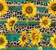 sunflowers and leopard print on green wood