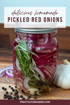 a jar filled with pickled red onions and herbs