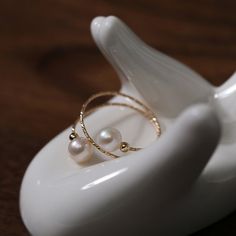 Product Details Process: 14K gold-filled Material: Natural Pearl (5.5-6mm) Size: ring height 1.3cm Weight: about 1g