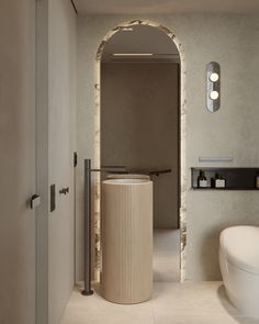 a bathroom with a toilet, sink and mirror