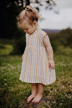 Cute Striped Cotton Dress, Striped Summer Dress For Playtime, Cute Striped Dress For Playtime, Striped Spring Dresses For Playtime, Playful Striped Summer Dresses, Cotton Short Sleeve Dresses With Vertical Stripes, Short Sleeve Cotton Dress With Vertical Stripes, Cotton Dress With Vertical Stripes And Short Sleeves, Striped Summer Dresses For Playdate