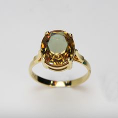 Real Oval Zultanite Ring Changing Color Ring 14k Gold Wedding Band Merriage Proposal Band Sultanite Ring Anniversary Gift For Her Women ▶ 𝙋𝙍𝙊𝘿𝙐𝘾𝙏 𝙁𝙀𝘼𝙏𝙐𝙍𝙀𝙎 * 14k Solid Gold Ring * Zultanite Gemstone Ring Width: 1.05 cm ( 0.41 inches) * Zultanite Gemstone Ring Lenght: 1.40 cm ( 0.55 inches) * Zultanite Gemstone Ring Height: 6.40 mm ( 0.25 inches) - Our Zultanite ring is real and natural stone. You can tell from the color change that it is original. It is not lab made. Zultanite ston Oval Citrine Rings With Prong Setting, Oval Citrine Ring With Prong Setting, Oval Citrine Rings Fine Jewelry, Fine Jewelry Oval Citrine Rings, Fine Jewelry Citrine Oval Rings, Yellow Gold Citrine Oval Diamond Ring, Oval Citrine Diamond Ring In Yellow Gold, Oval Citrine Diamond Ring, Oval Citrine Diamond Ring With Prong Setting