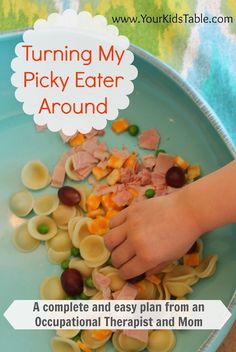 a child's hand picking up some pasta from a bowl with the words turning my picky eater around