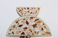 I've always loved terrazzo as a design element, and what better way to use some of my scrap glass than these terrazzo objects.  Each terrazzo is cast into hand-bent brass forms, and polished by hand to revel the glass and brass inclusions - a very long process, but a rewarding one.  This is real concrete terrazzo, not resin or jesmonite.   Use them as a landing spot for jewelry, desk accessory, shelf decor, or as part of a tablescape! This is a ready-to-ship item, but please note that it may take a few days to clean & pack orders. Shipping within the US is typically 3-4 days. If you need your order asap, just add a note in the order and you'll be contacted in the event your request can't be accommodated. Terazzo Concrete Art, Jewelry Desk, Tile Stained, Concrete Terrazzo, Stained Glass Studio, Panels Wall, Custom Windows, Panel Art, Glass Tile