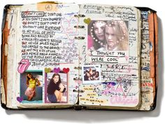 an open book with many pictures and writing on the pages that are covered in graffiti