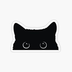 a black cat with big eyes sticker