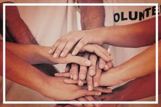 several hands stacked together in the middle of a square frame with words volunteer written on it